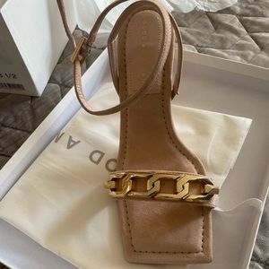 Brand new, never worn, light beige/pink suede ankle strap statement heels